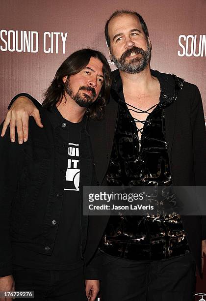 Dave Grohl and Krist Novoselic of Nirvana attend the premiere of "Sound City" at ArcLight Cinemas Cinerama Dome on January 31, 2013 in Hollywood,...