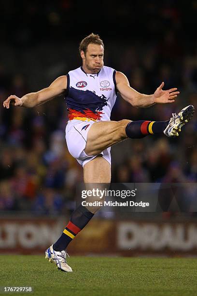 Ben Rutten of the Crows kicks the ball during the round 21 AFL match between the Western Bulldogs and the Adelaide Crows at Etihad Stadium on August...