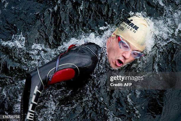 Crown Prince Frederik of Denmark participates in the KMD Ironman Copenhagen 2013 swimming part in Copenhagen, Denmark, on August 18, 2013. The...