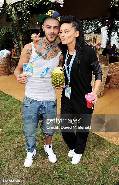 Abz Love of '5ive' and Vicky Fallon attend the Mahiki Coconut Backstage Bar during day 2 of V Festival 2013 at Hylands Park on August 18, 2013 in...