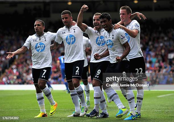 Roberto Soldado of Tottenham Hotspur celebrates scoring from the penalty spot with team mates Aaron Lennon, Kyle Walker, Paulinho and Gylfi...