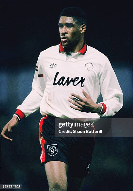 English footballer Brian Deane, of Sheffield United, during an English Premier League match against Aston Villa at Villa Park, Birmingham, 27th...