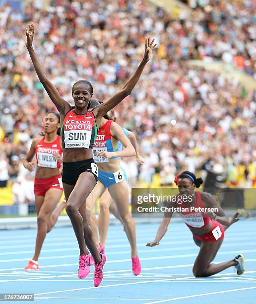Alysia Johnson Montano of the United States falls over at the line AS Eunice Jepkoech Sum of Kenya crosses the line to win gold in the Women's 800...