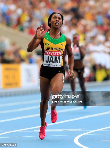 Shelly-Ann Fraser-Pryce of Jamaica crosses the line to win gold the Women's 4x100 metres final during Day Nine of the 14th IAAF World Athletics...