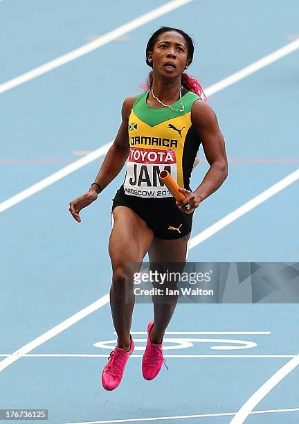 Shelly-Ann Fraser-Pryce of Jamaica crosses the line to win gold the Women's 4x100 metres final during Day Nine of the 14th IAAF World Athletics...