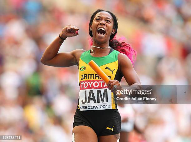 Shelly-Ann Fraser-Pryce of Jamaica crosses the line to win gold the Women's 4x100 metres final during Day Nine of the 14th IAAF World Athletics...