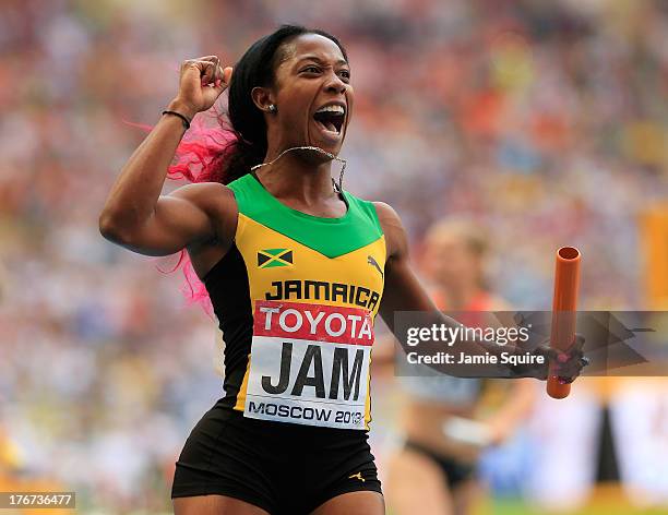 Shelly-Ann Fraser-Pryce of Jamaica crosses the line to win gold the Women's 4x100 metres final during Day Nine of the 14th IAAF World Athletics...