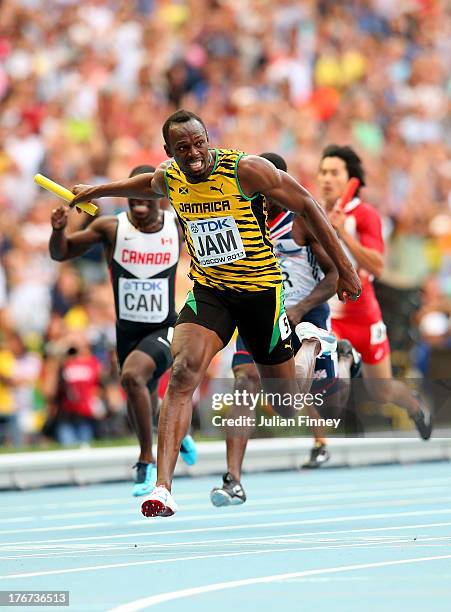 Usain Bolt of Jamaica crosses the line first win gold in the Men's 4x100 metres final during Day Nine of the 14th IAAF World Athletics Championships...