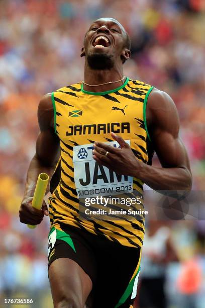 Usain Bolt of Jamaica crosses the line first win gold in the Men's 4x100 metres final during Day Nine of the 14th IAAF World Athletics Championships...