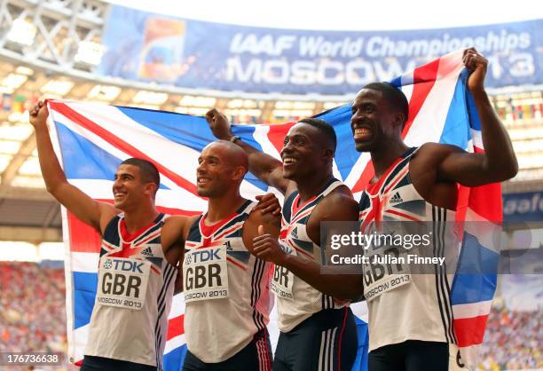 Adam Gemeli, James Ellington, Harry Aikines-Aryeetey and Dwain Chambers of Great Britain pose after the Men's 4x100 metres final during Day Nine of...