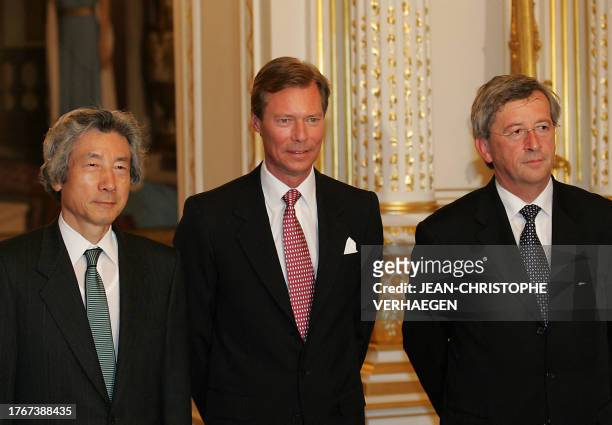 Luxembourg Prime Minister Jean-Claude Juncker , Grand Duke Henri and Japanese Prime Minister Junichiro Koizumi pose at his arrival for the 14th...