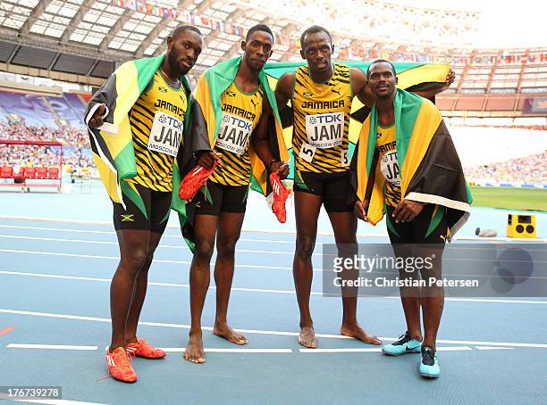 Gold medalists Nickel Ashmeade, Kemar Bailey-Cole, Usain Bolt and Nesta Carter of Jamaica pose after the competes in the Men's 4x100 metres final...