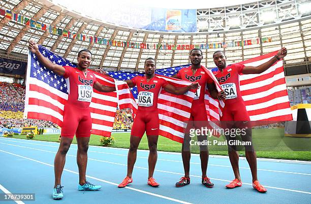 Silver medalists Mike Rodgers, Charles Silmon, Justin Gatlin and Rakieem Salaam of the United States pose after the competes in the Men's 4x100...