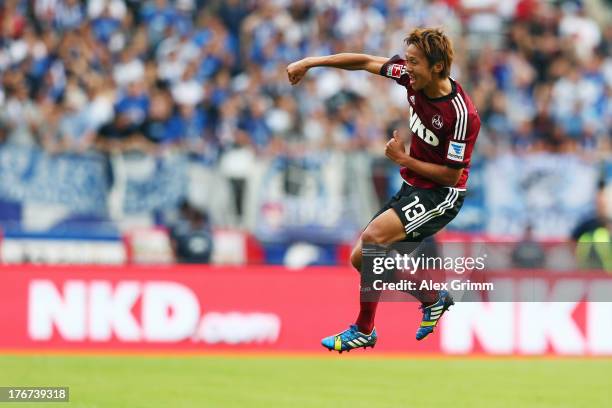 Hiroshi Kiyotake of Nuernberg celebrates his team's second goal during the Bundesliga match between 1. FC Nuernberg and Hertha BSC Berlin at Grundig...