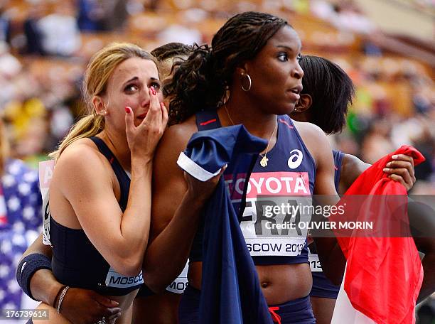 France's Celine Distel-Bonnet cries after winning silver medal during the women's 4x100 metres relay final at the 2013 IAAF World Championships at...