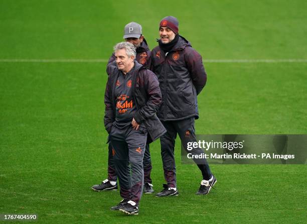 Manchester City assistant coach Juanma Lillo and manager Pep Guardiola during a training session at the City Football Academy, Manchester. Picture...