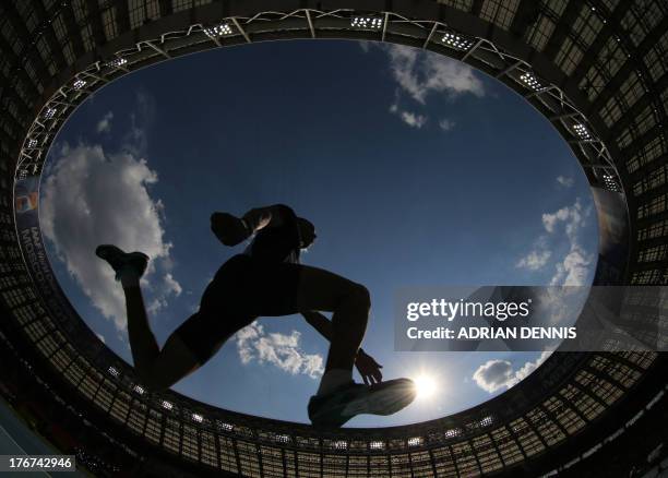 France's Yoann Rapinier competes in the men's triple jump final at the 2013 IAAF World Championships at the Luzhniki stadium in Moscow on August 18,...