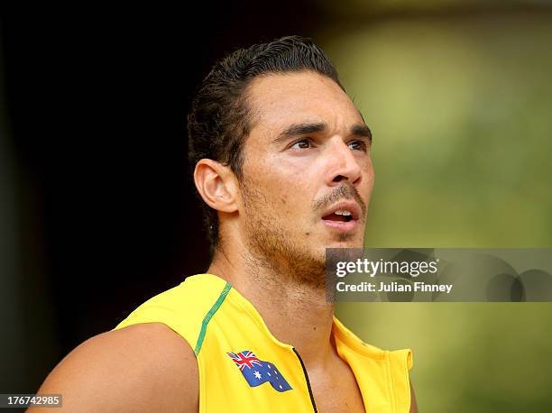 Joshua Ross of Australia look despondent as they fail to finish their Men's 4x100 metres heat during Day Nine of the 14th IAAF World Athletics...