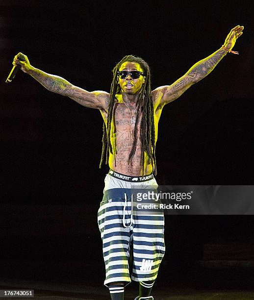 Rapper Dwayne Michael Carter, Jr. Aka Lil Wayne performs in concert as part of America's Most Wanted Tour at Austin360 Amphitheater on August 17,...