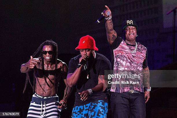 Rappers Lil Wayne, Mack Maine, and Birdman perform in concert as part of America's Most Wanted Tour at Austin360 Amphitheater on August 17, 2013 in...