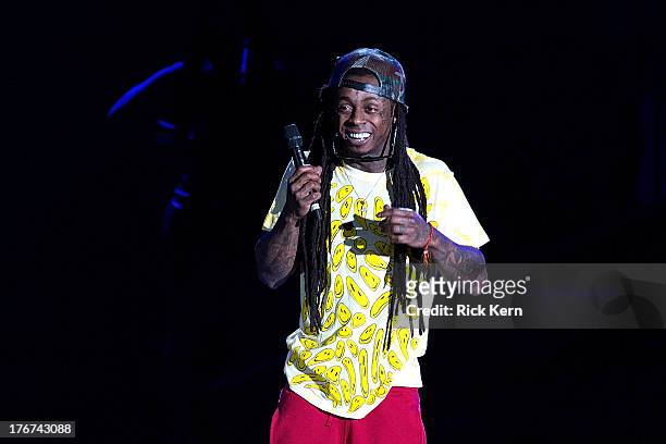 Rapper Dwayne Michael Carter, Jr. Aka Lil Wayne performs in concert as part of America's Most Wanted Tour at Austin360 Amphitheater on August 17,...
