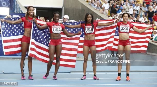 Jeneba Tarmoh, US Alexandria Anderson, US English Gardner and US Octavious Freeman celebrate after taking gold in the women's 4x100 metres relay...