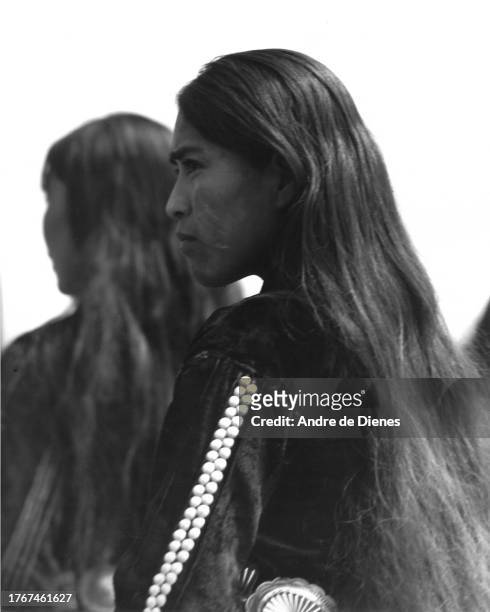 Profile of an unidentified woman in traditional attire, southwest America, mid twentieth century.