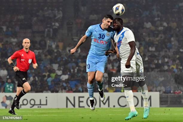 Al-Hilal SFC's defender Kalidou Koulibaly and Mumbai City FC's forward Jorge Pereyra Diaz vie for the ball during the AFC Champions League 2023/24...