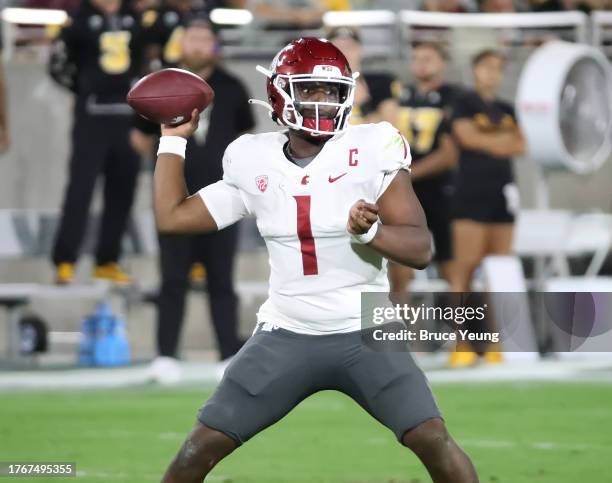 Cameron Ward of the Washington State Cougars prepares to throw a pass in the second quarter against the Arizona State Sun Devils at Mountain America...