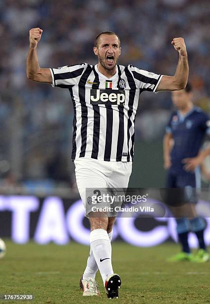 Giorgio Chiellini of FC Juventus celebrates scoring the second goal during the TIM Supercup match between SS Lazio and FC Juventus at Olimpico...