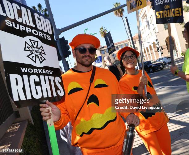Protesters join the picket line outside Warner Bros. Studios on October 31, 2023 in Burbank, California. SAG-AFTRA has been on strike since July 14,...