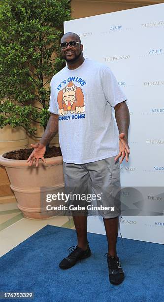 Former NBA player Shaquille O'Neal arrives at the Azure Luxury Pool at The Palazzo Las Vegas on August 18, 2013 in Las Vegas, Nevada.