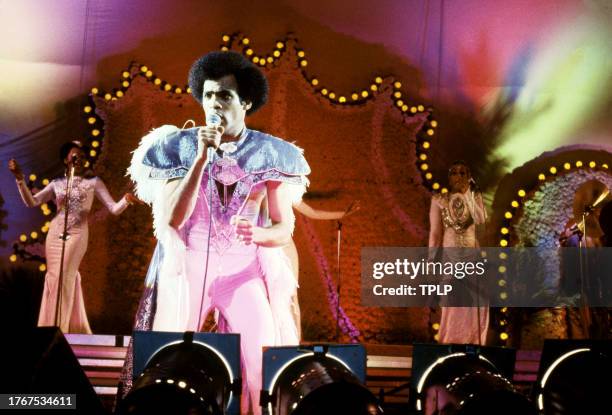 Aruban singer Bobby Farrell , is backed by Liz Mitchell, Marcia Barrett and Maizie Williams, of the German vocal group Boney M., during a concert in...