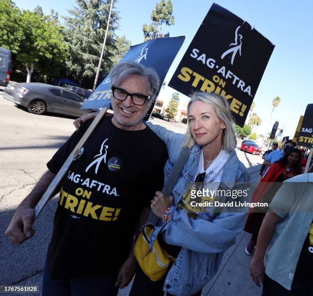 Robert Carradine and Ever Carradine join the picket line outside Warner Bros. Studios on October 31, 2023 in Burbank, California. SAG-AFTRA has been...