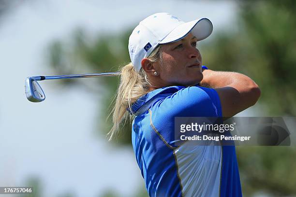 Suzann Pettersen of Norway and the European Team hits her tee shot on the second hole during the final day singles matches of the 2013 Solheim Cup on...