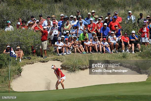 Jessica Korda of the United States Team hits her second shot from the bunker on the second hole during the final day singles matches of the 2013...