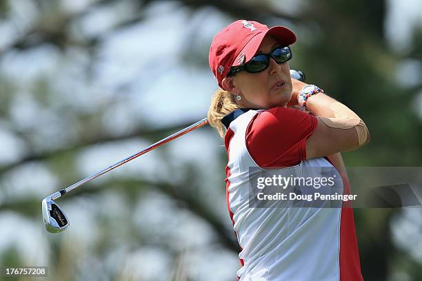 Cristie Kerr of the United States Team takes her tee shot on the second hole during the final day singles matches of the 2013 Solheim Cup on August...