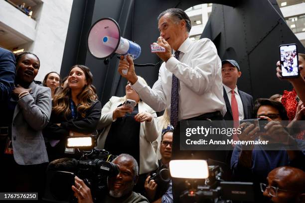 Sen. Mitt Romney speaks at the start of the annual "BiPAWtisan Howloween" dog parade in the Hart Senate Office Building on October 31, 2023 in...