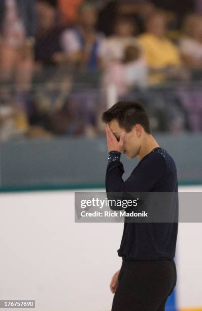 Patrick Chan doesn't appear all that happy with his routine after the finish at Skate Canada Summer Skate event in Thornhill, August 18, 2013. The...