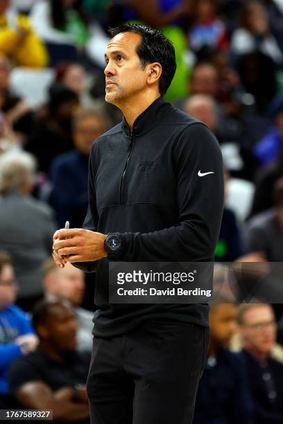 Head coach Erik Spoelstra of the Miami Heat looks on against the Minnesota Timberwolves in the first quarter at Target Center on October 28, 2023 in...