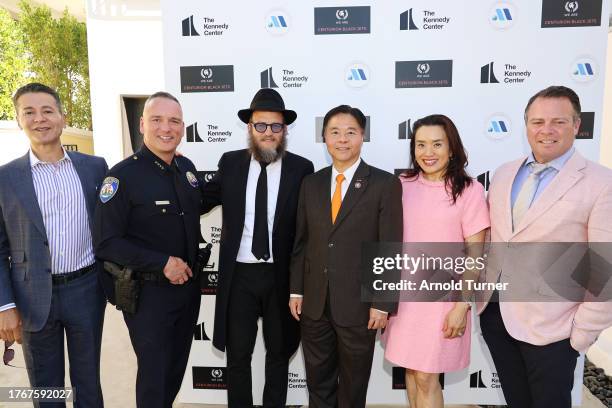 Andrew Tavakoli, Mark Stainbrook, Beverly Hills Chief of Police, Rabbi Yossi Cunin, Congressman Ted Lieu, Betty Lieu, and Jonathan Fried attend as...