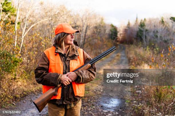 a beautiful day for an autumn hunt - hunter stock pictures, royalty-free photos & images