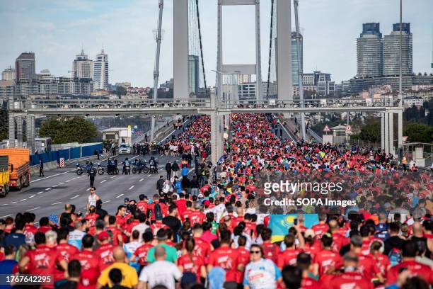 Runners are seen passing through the 15 July Martyrs Bridge during the 45th Istanbul Marathon. The Istanbul Marathon is a unique event, being the...