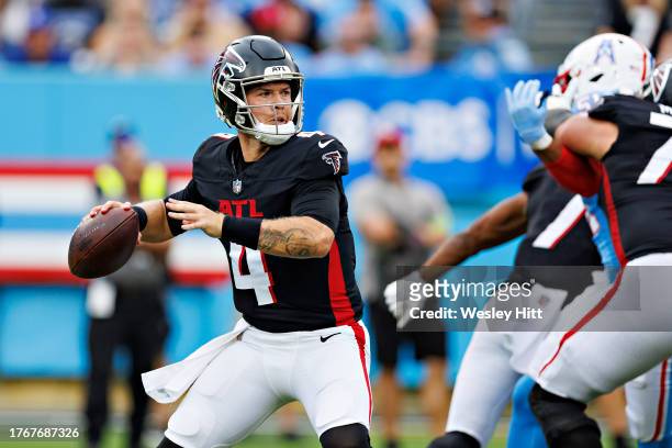 Taylor Heinicke of the Atlanta Falcons drops back to pass during the game against the Tennessee Titans at Nissan Stadium on October 29, 2023 in...