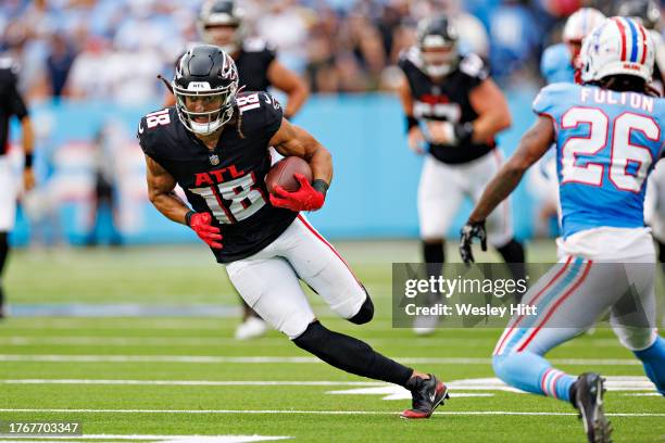 Mack Hollins of the Atlanta Falcons runs the ball during the game against the Tennessee Titans at Nissan Stadium on October 29, 2023 in Nashville,...