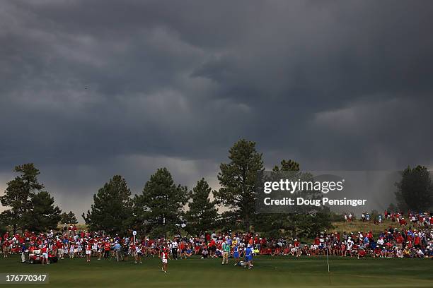 Catriona Matthew of Scotland and the European Team and Gerina Piller of the United States Team are on the 16th green as play in suspended due to...