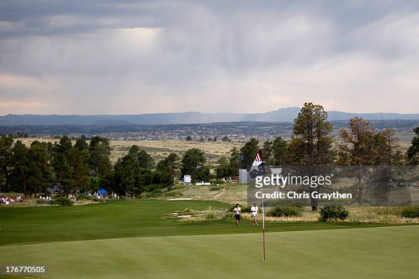 Play is suspended due to severe weather in the area during the final day singles matches of the 2013 Solheim Cup on August 18, 2013 at The Colorado...