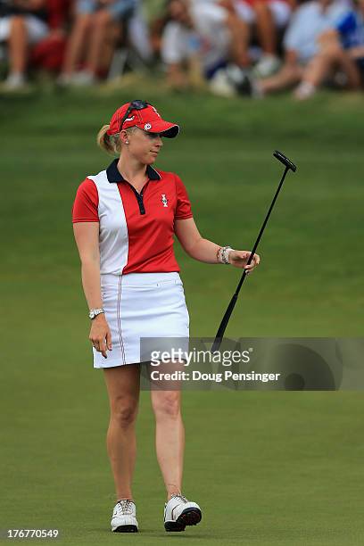 Morgan Pressel of the United States Team reacts after missing a putt and loosing the 16th hole to Carlota Ciganda of Spain and the European Team...