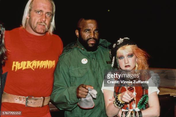 Hulk Hogan, Mr. T and Cyndi Lauper attend the 27th Grammy Awards, held at the Shrine Auditorium, Los Angeles, California, United States, 26th...