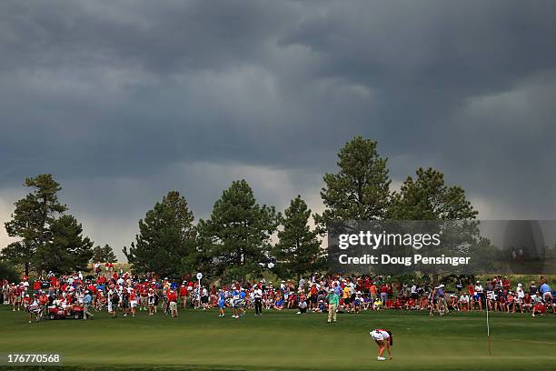 Gerina Piller of the United States Team marks her ball in her match against Catriona Matthew of Scotland and the European Team on the 16th green as...